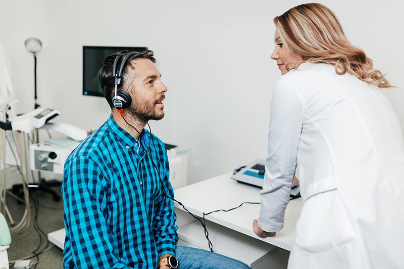 hearing-test-man-hearing-loss-scaled.jpg